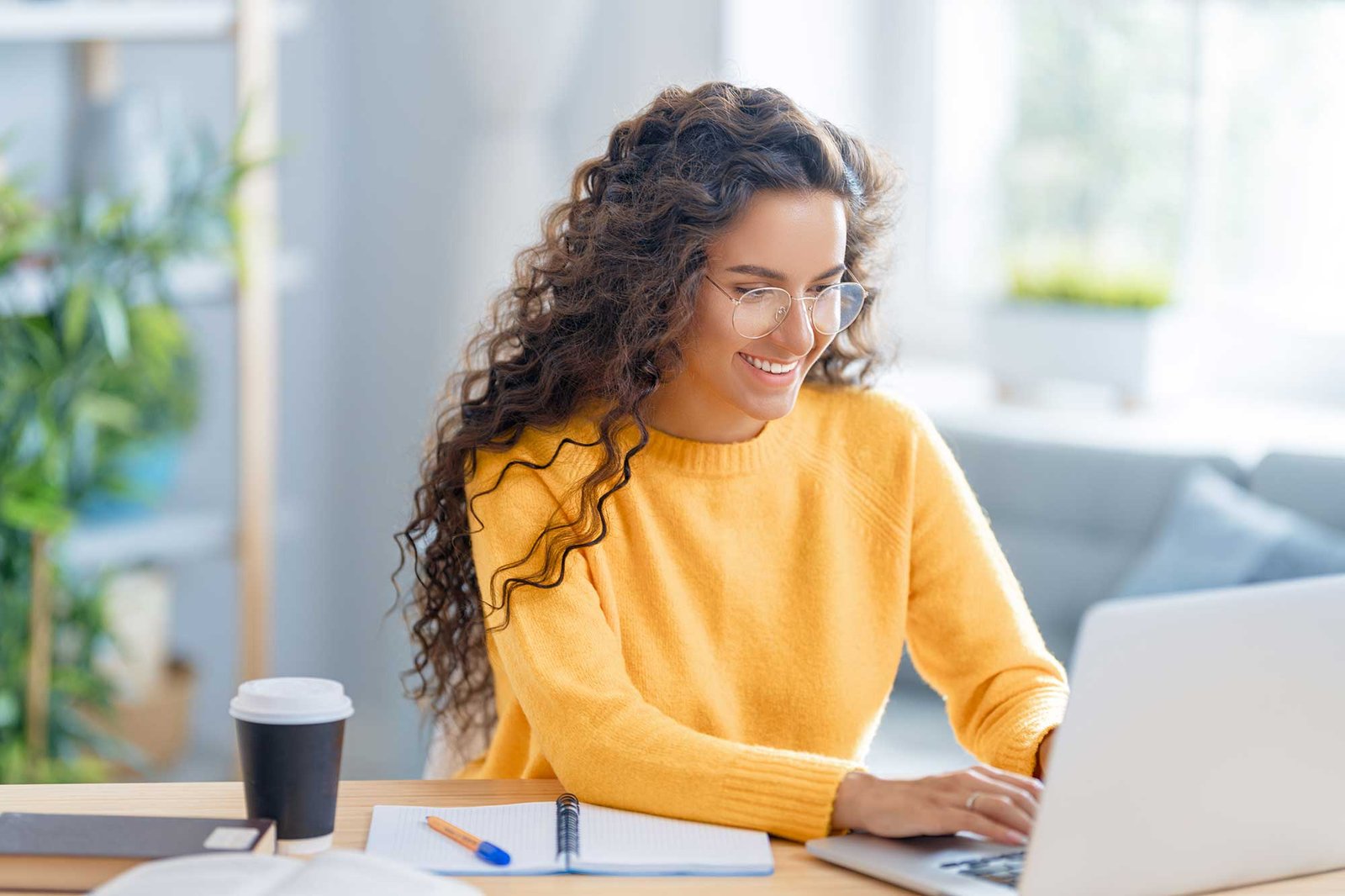woman working on laptop at home